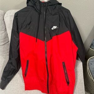 Nike Black and Red Raincoat Bold Athletic Design